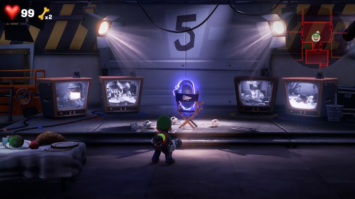 Luigis mansion 3 movie set with 4 tvs and a ghost director