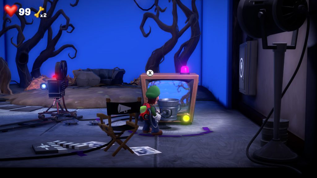 Luigi's Mansion 3 coop spooky movie set with tv, camera and directors chair