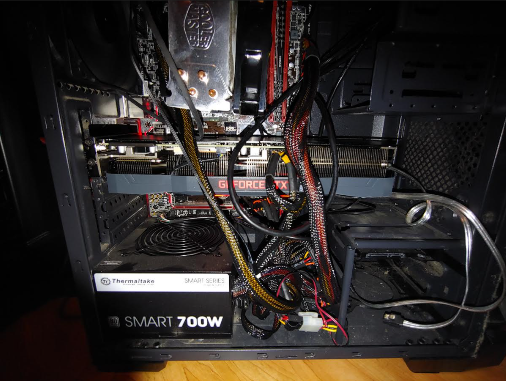 PNY Nvidia Geforce RTX 3090 installed inside my old PC tower with jumbles of wires