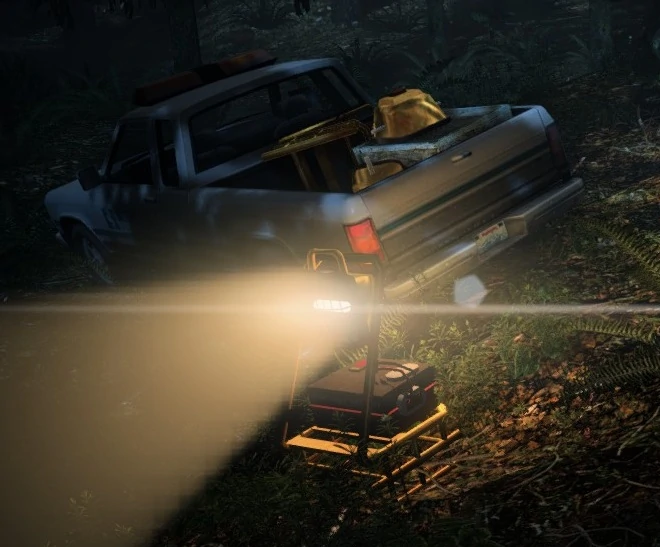 Alan Wake Construction light in front of a pickup truck