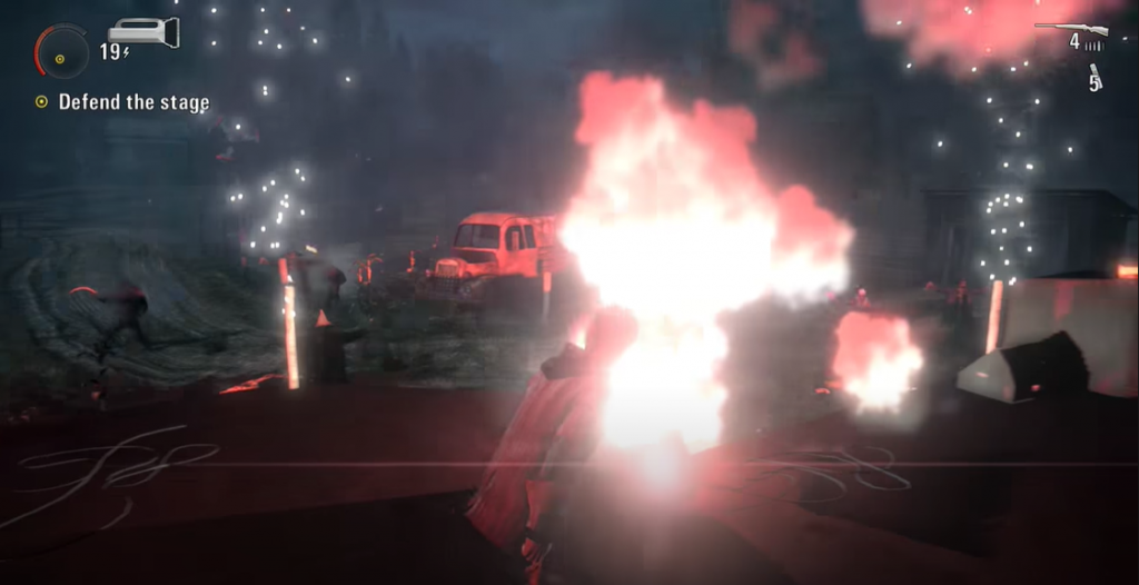 Alan Wake fighting on the rock and roll stage with pyrotechnics and fireworks