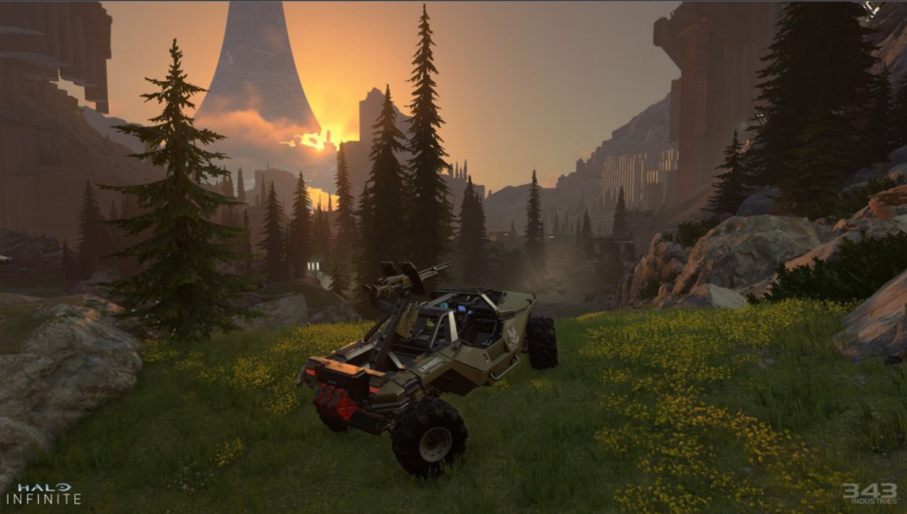 Halo Infinite gameplay with sun setting in the background amongst the trees