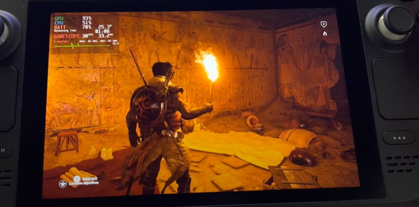 AC Origins on Steam Deck with Bayek holding a torch in an Egyptian tomb