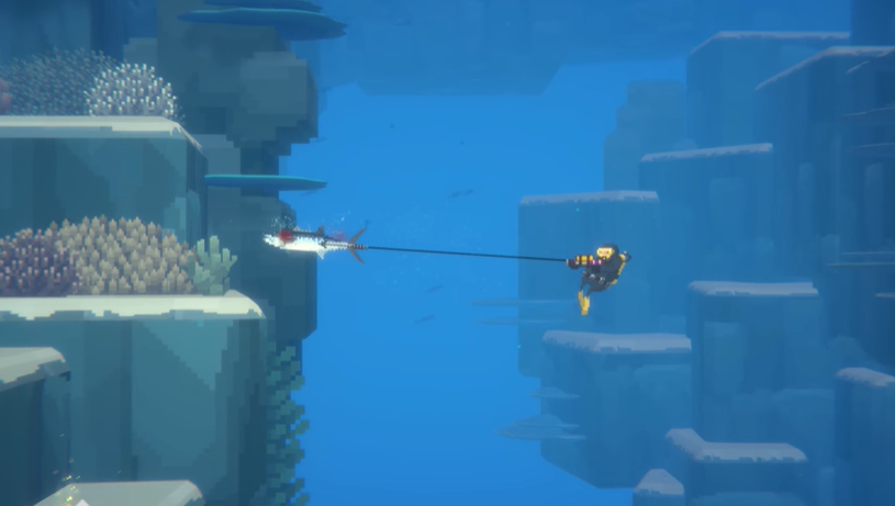 Dave the Diver catching a fish with a harpoon gun underwater