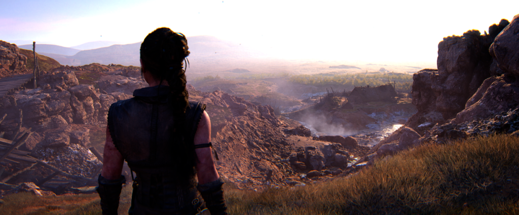 Senua in HB2 looking over the landscape in the daytime